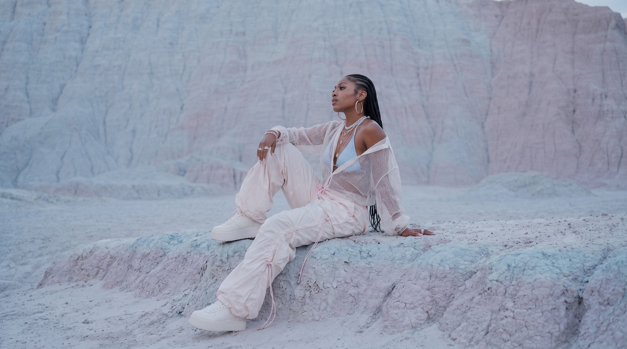 Naiko — seated on chalk rock